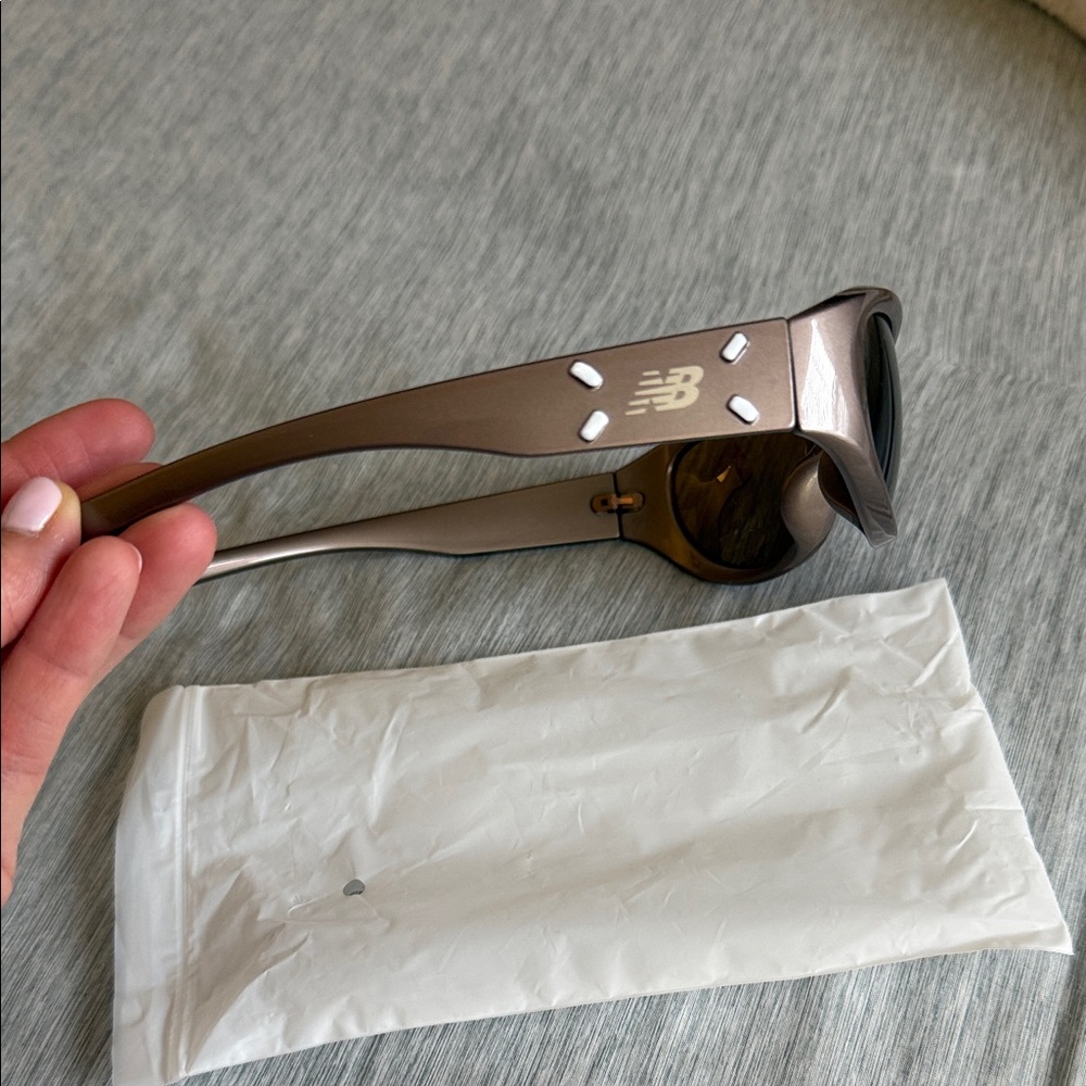 NEW, never worn..New Balance Bronze Sunglasses